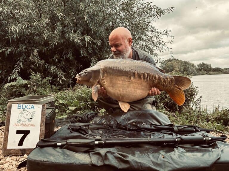 Colin Douglas with a mirror carp weighing 40 lb 4 oz